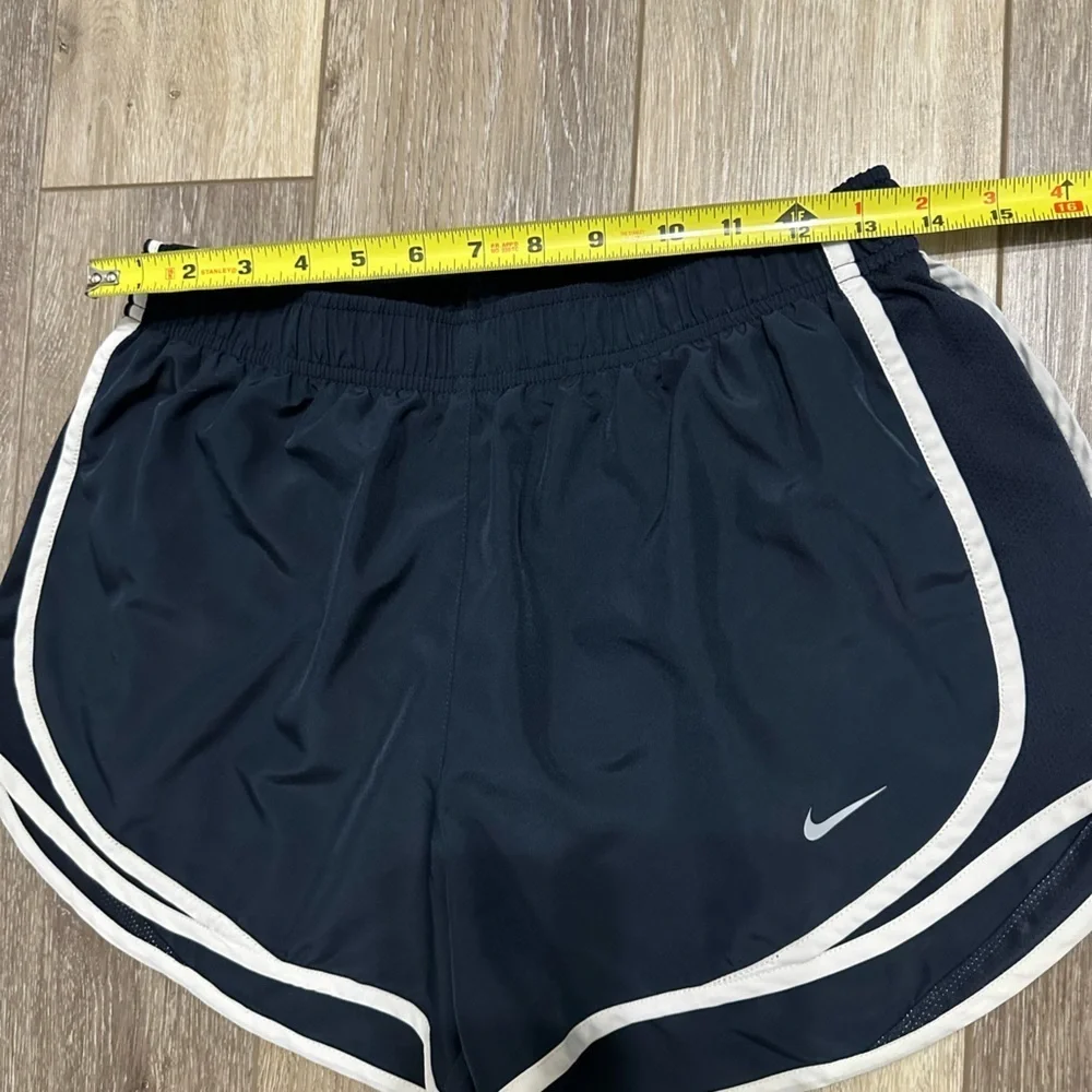 🛍️ Nike dri-fit black with white trimmed shorts great condition.